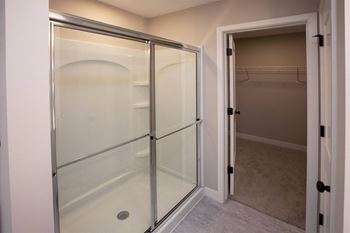 Walk-in shower with glass door*